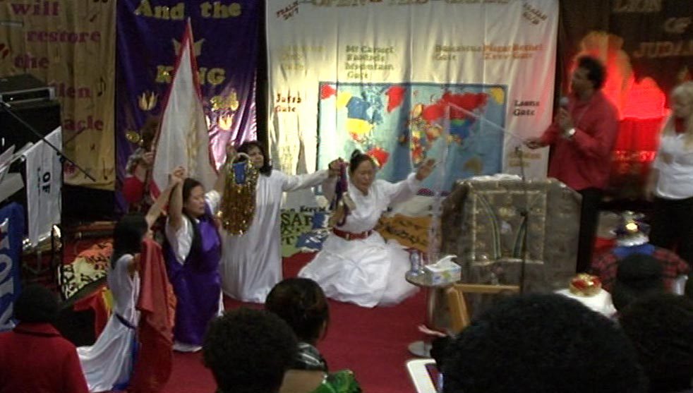 Canberra Psalm 24:7 conference 2012: Asian dancers, and Apostle Norman speaking