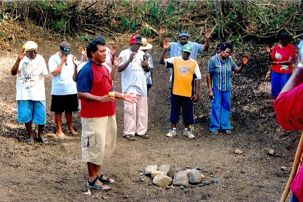Norman leading prayer at the Darnley Island conference, 9/11 2006